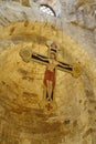 Cross from main nave of Romanic church San Cataldo Royalty Free Stock Photo