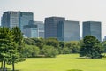Marunouchi district skyline from Imperial Palace East Gardens Ninomaru on a summer clear morning Royalty Free Stock Photo