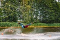 Young man wakeboarding on a lake Royalty Free Stock Photo