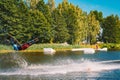 Young man wakeboarding on a lake Royalty Free Stock Photo