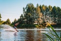 Young man wakeboarding on a lake Royalty Free Stock Photo