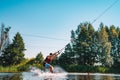 Young man wakeboarding on a lake Royalty Free Stock Photo