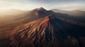Dormant volcano at sunrise in aerial perspective