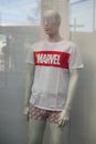 Marvel logo on white teeshirt in a fashion store showroom