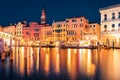 Marvelous night scene of famous Canal Grande. Illuminated houses and Rialto Bridge. Picturesque summer cityscape of Venice, Italy