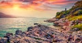 Marvelous summer sunset on empty Paralia Pipitos Beach