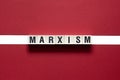 Marxism word concept on cubes Royalty Free Stock Photo