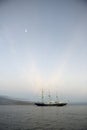 Mary Anne anchored under the full moon, Punta Espinosa, Fernandina Island, Galapagos Islands