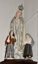 Mary of Fatima with the shepherd children