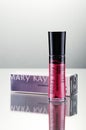 Mary Kay cosmetics isolated on gradient background.