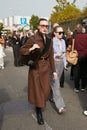 Mary Leest with brown coat before Tods fashion show, Milan Fashion Week street style