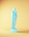 Mary Mother with Baby Jesus Blue Statue Religious Art Woman with Yellow Beige Background Quarter View Royalty Free Stock Photo