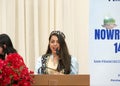 Maryam Fasihy speaking at Nowruz celebration at City Hall.