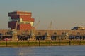 MAS museum with old industrial cranes in front, view from across river Scheldt in Antwerp