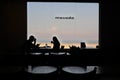 Silhouette of tourist couple dining in a cafe restaurant at Masada fortress israel