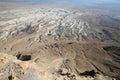 Waterless landscape of the Judean desert, view from Masada towards the Dead Sea, Israel Royalty Free Stock Photo