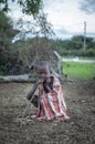 Masai boy at his home village