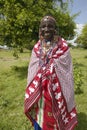 Masai female in robe in village near Tsavo National Park, Kenya, Africa