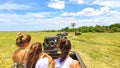 MASAI MARA, KENYA, January, 2019:: Tourists in all-terrain vehicle exploring the elephants in Masai Mara, Kenya in safari drive