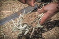 Masai men making fire