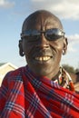 Masai Senior Elder with sun glasses in village of Nairobi National Park, Nairobi, Kenya, Africa