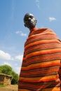Masai with traditional colorful Masai blanket