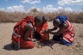 Masai warriors making fire