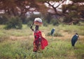 Masai woman on the road to water hole