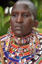 Kenya: Masai women with traditional glass perls neck rings. Royalty Free Stock Photo