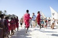 Masai worriers entertaining tourist on the beach of Zanzibar