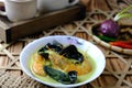 Masak lemak udang or Prawn coconut curry on white bowl