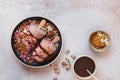 Masala chai kulfi served with biscuit crumbles, chocolate syrup and dry rose petals Royalty Free Stock Photo