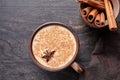 Masala tea chai latte traditional warm Indian sweet milk spiced drink, ginger, cinammon sticks, spices blend organic Royalty Free Stock Photo