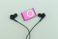 Mascara, Algeria - January 01, 2020: Flat lay of iPod shuffle with black earphone