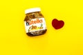 Mascara Algeria - June 03, 2020: NUTELLA jar and heart pillow, Hazelnut Spread with Cocoa produced by Ferrero. love chocolate conc