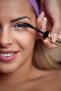 Mascara applying eyes make-up Royalty Free Stock Photo