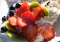 Mascarpone cake with strawberry, kiwi, blueberry Royalty Free Stock Photo