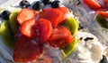 Mascarpone cake with strawberry, kiwi, blueberry Royalty Free Stock Photo