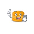 Mascot design of orange macaron speaking on phone