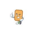 Mascot design style of biscuit showing Thumbs up finger