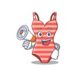Mascot design of swimsuit announcing new products on a megaphone