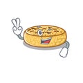 Mascot of funny crumpets cartoon Character with two fingers