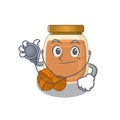 A mascot picture of walnut butter cartoon as a Doctor with tools Royalty Free Stock Photo