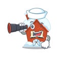 Mascot winter house a cartoon isolated sailor holding binocular