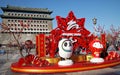 The mascots of the Beijing Winter Olympics 2022 are placed on an ancient commercial street in Beijing.