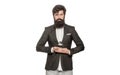 Masculine perfume, bearded man in a suit. Male holding up bottle of perfume. Man perfume, fragrance. Perfume or cologne Royalty Free Stock Photo