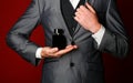 Masculine perfume. Male fragrance and perfumery. Perfume or cologne bottle. Cosmetics. Expensive suit. Rich man prefers