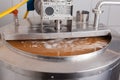 A mash-brew boiler for stirring the wort. The process of brewing beer