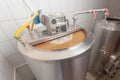 A mash-brew boiler for stirring the wort. The process of brewing beer