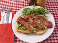 Mashed avocado on toast and bacon Royalty Free Stock Photo